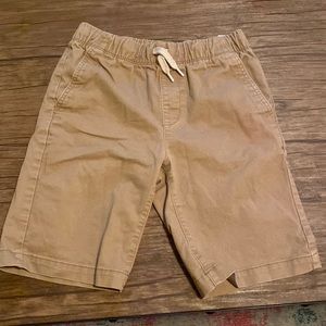 Khaki tan boy shorts. Only worn 1x. Size L 10-12